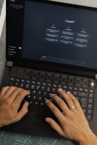 man using laptop wit chat gpt