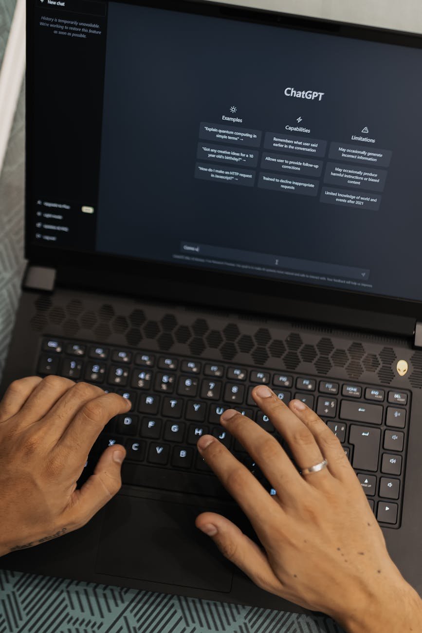 man using laptop wit chat gpt