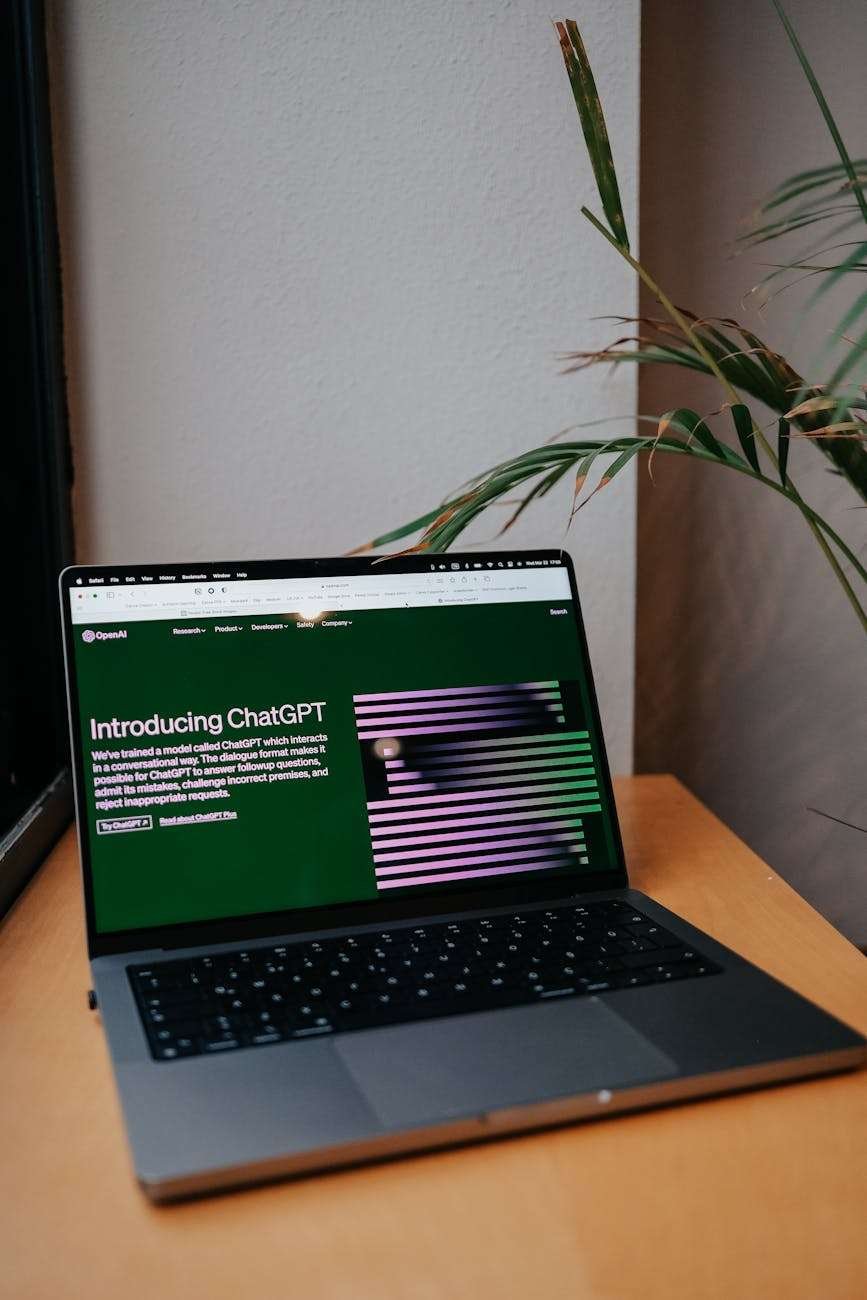 a laptop displaying chatgpt site